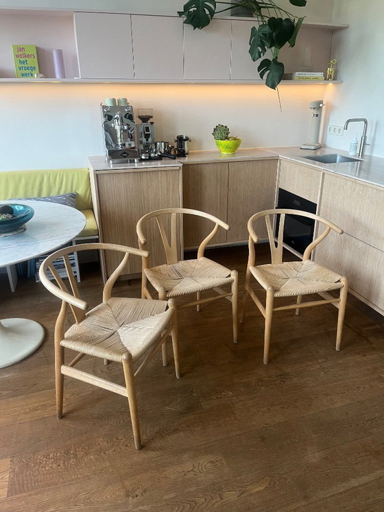 Image 1 of 4 x Carl Hansen & Son CH24 Wishbone stoel Classic Natural gezeept beuken