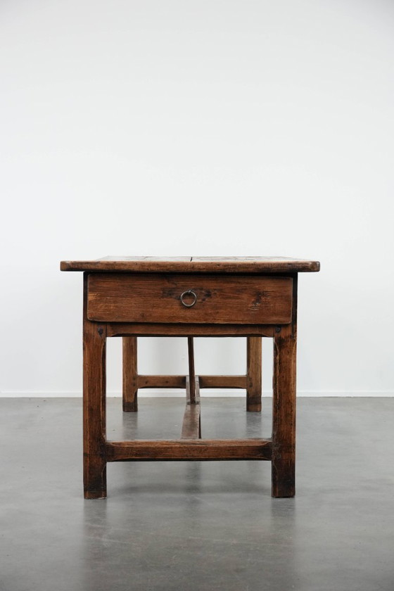 Image 1 of Robust antique French 6-person dining table made of fruit wood with 3 drawers from the late 18th century