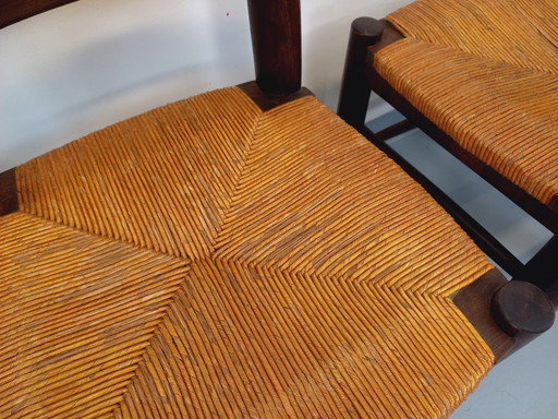 Set of 4 vintage brutalist chairs by Georges Robert in wood and straw from the 1950s and 60s