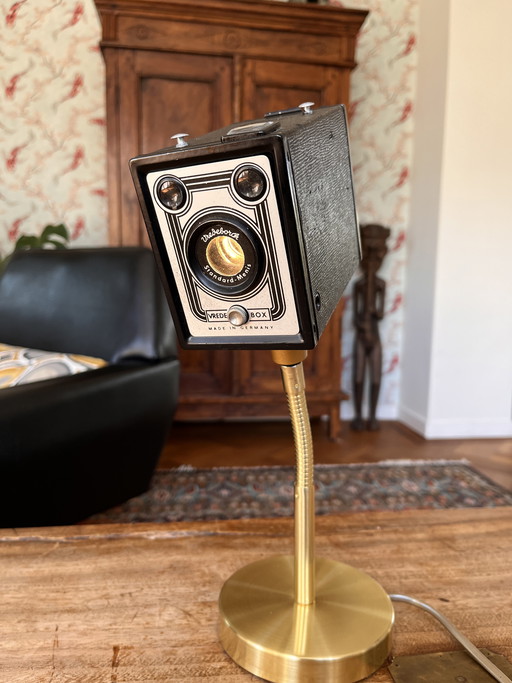 Unique vintage box camera lamp on a ‘golden’ lamp base