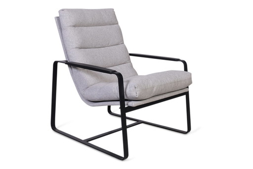 Fauteuil + pouf Leolux Indra