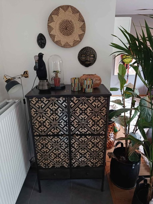 Beautiful cabinet in black metal with wooden panels at the front