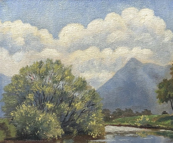 Image 1 of Antiek origineel, gesigneerd olieverfschilderij van een berglandschap uit het begin van de 20e eeuw.