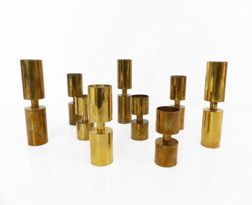Set of 9 Scandinavian candlesticks in solid brass Zoéga, Sweden, 1976