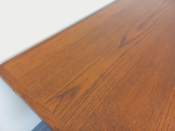Image 1 of Scandinavian rectangular vintage dining table by Johannes Andersen for Samcom from the 60s in teak with integrated extensions