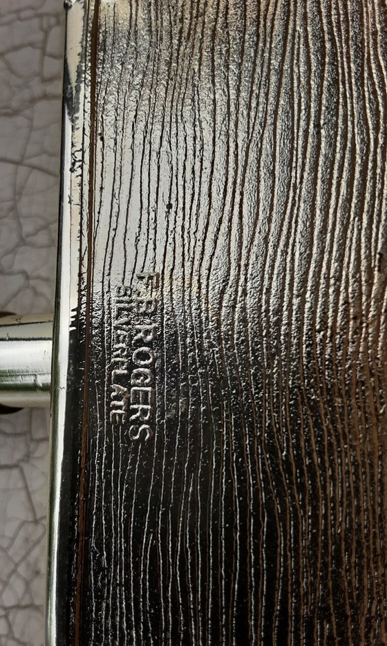 Image 1 of Recogemigas plateado , F.B. Rogers , 1960