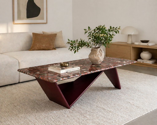 Vintage design coffee table with natural stone top and burgundy base