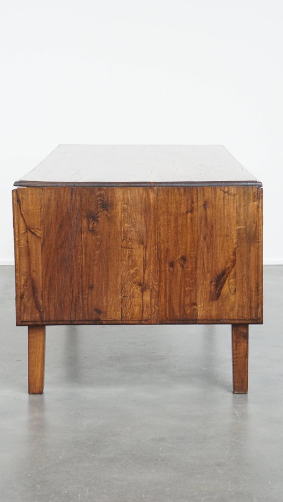 Image 1 of Table de salle à manger ancienne en chêne du début des années 1900 avec plateau rabattable d'un côté