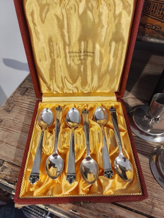 Image 1 of Posate antiche, candeliere e contenitore in argento del 1919.
