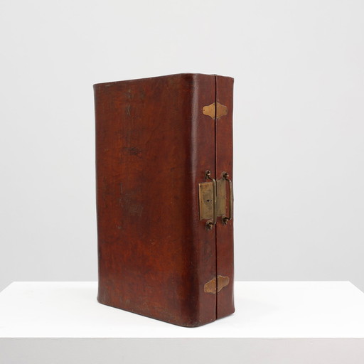 Vintage brown leather suitcase with copper details, China 1900s