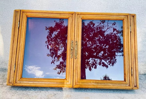 Vetrina da parete in legno con anta in vetro