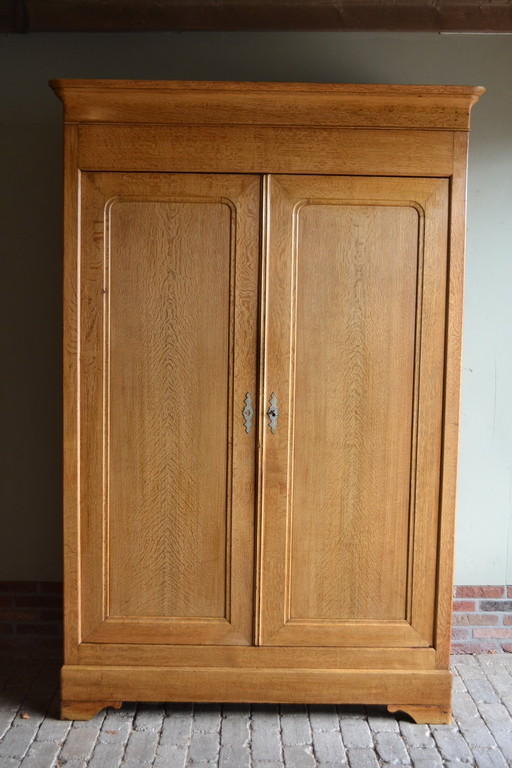 Large sleek antique oak wood Louis Philippe cabinet.