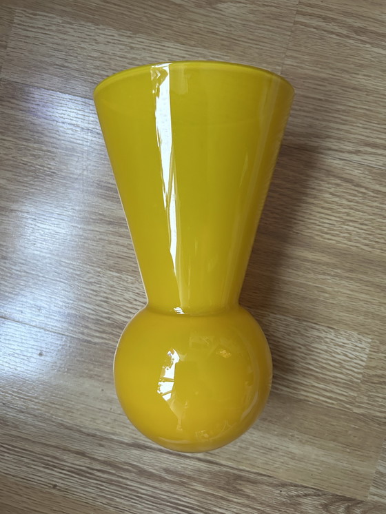 Image 1 of Yellow keyhole vase manufactured by Royal Leerdam