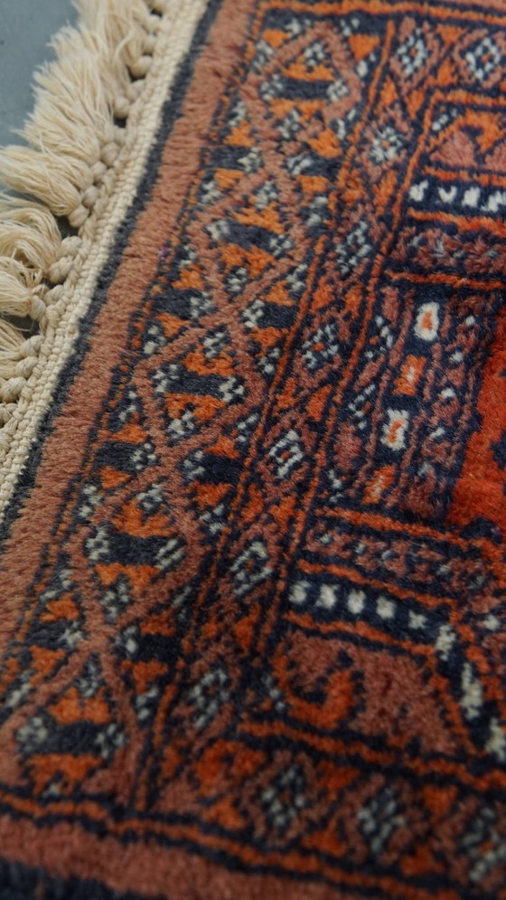 Image 1 of Petit tapis ornemental 38x30cm