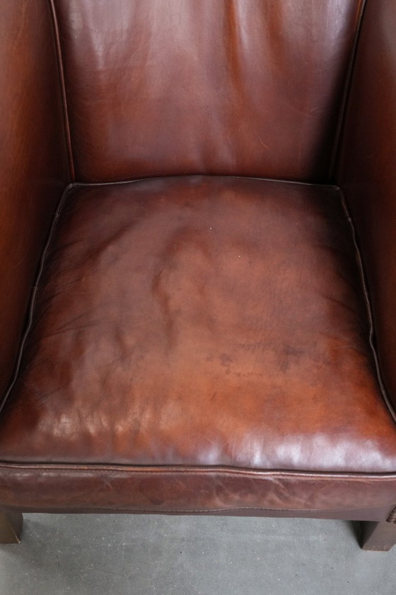 Image 1 of 2 x Vintage schapenleren clubfauteuil met siernagels 