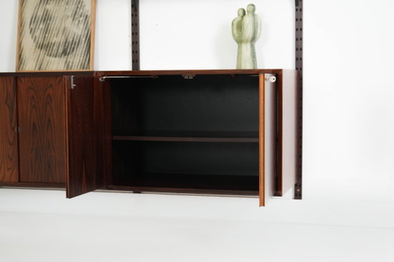 Modulaire stellingen van palissanderfineer van Poul Cadovius, Denemarken, jaren 70. – Wandkast, Mdf (photo 13 of 27)