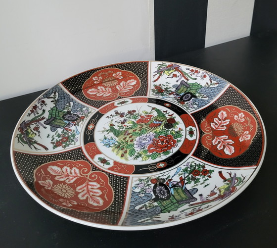 Image 1 of Piatto giapponese in ceramica Imari con motivo a pavone.