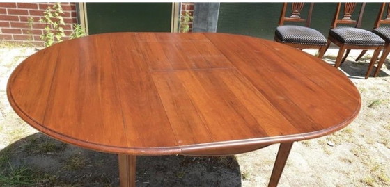 Image 1 of Kersenhout uitschuifbaar eetkamer tafel 