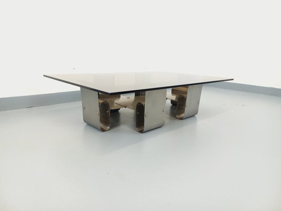 Image 1 of Large rectangular coffee table by François Monnet, vintage Space Age style, in steel and smoked glass from the 1970s