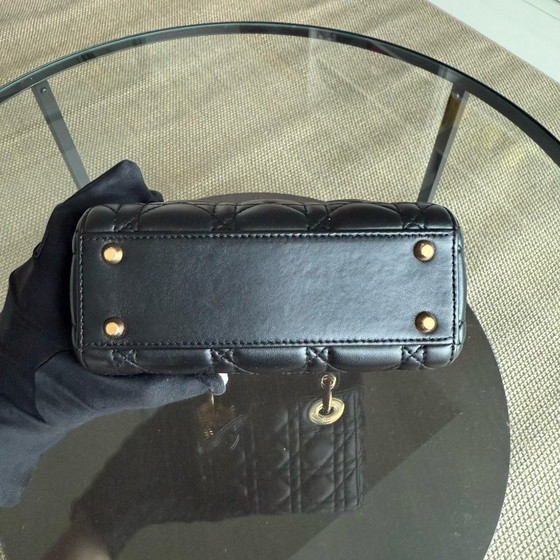 Image 1 of DIOR LADY MINI - PELLE DI AGNELLO CANNAGE, DETTAGLI IN ORO NERO, CINTURINO REGOLABILE