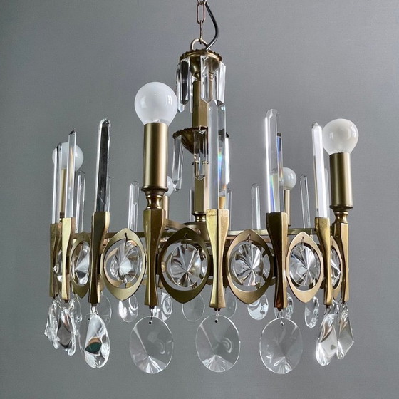 Image 1 of Gaetano Sciolari, five-light chandelier from the "Ovali" series, 1960s. Burnished brass frame and original optical crystals.