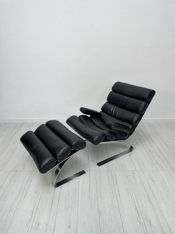 Image 1 of COR Sinus loungestoel en poef in zwart leer van Reinhold Adolf & Hans-Jürgen Schröpfer – Designicoon uit de jaren 70