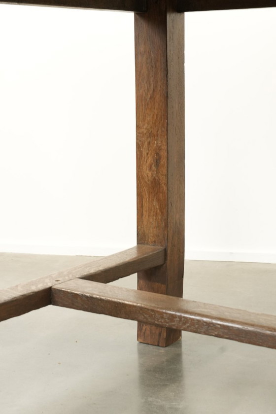 Image 1 of Large antique French farmhouse dining table made of oak from the early 1800s