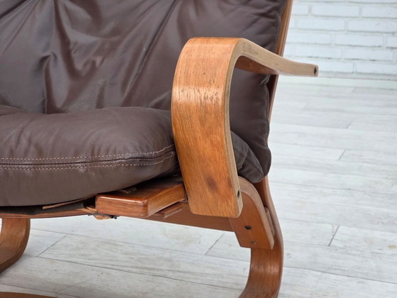 Image 1 of Fauteuil danois des années 1970 de la marque Komfort, cuir, toile et bois courbé.