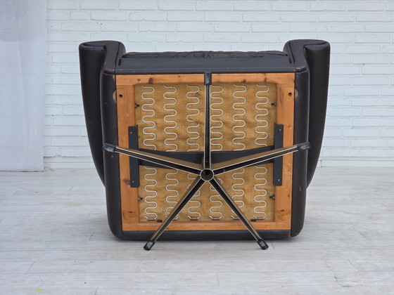 Image 1 of Deense draaibare fauteuil uit de jaren 60 van Aage Christensen, meubelleder.