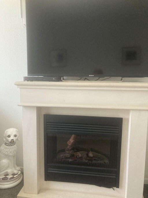 Chimenea eléctrica de ladrillo de arena y cal