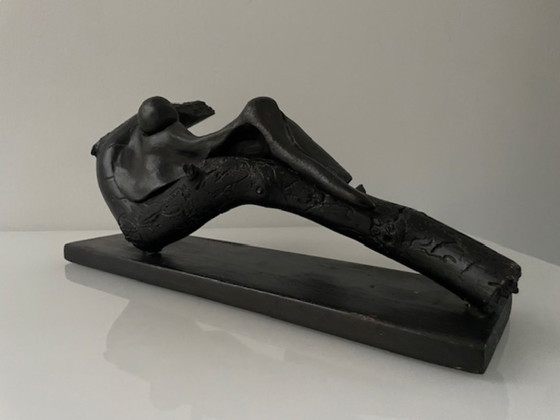 Image 1 of Expressive wooden sculpture with a reclining figure