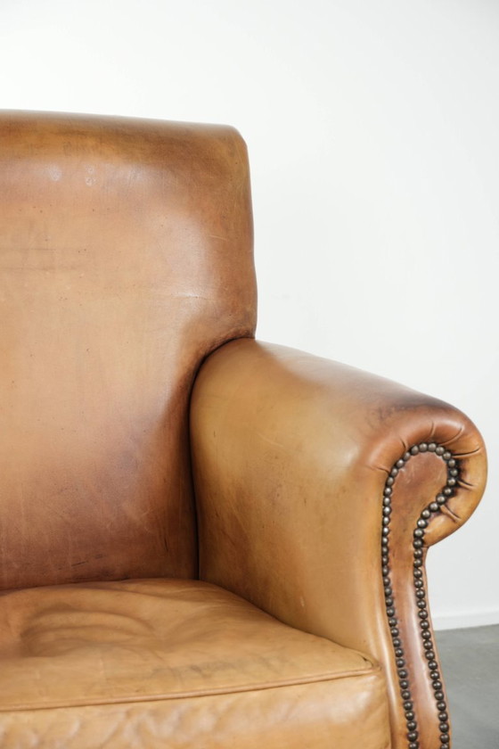 Image 1 of Beautiful and comfortable armchair made of cowhide leather with a characterful and charming English look.