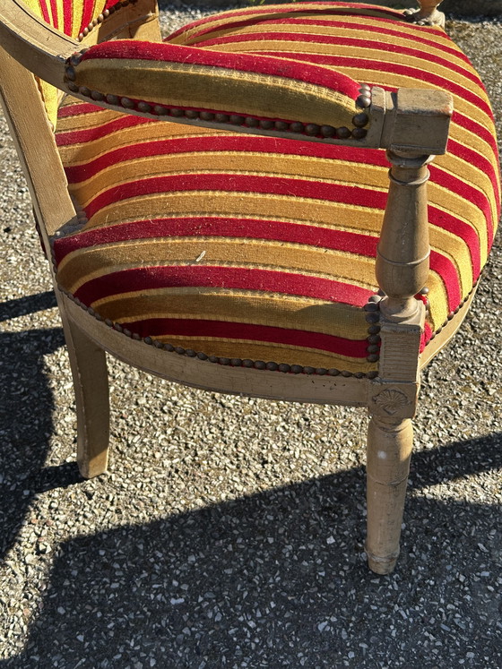 Image 1 of Louis XVI cabrioletfauteuil - Gepatineerd hout en gestreept fluweel