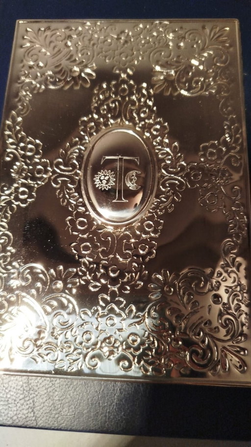 Telefonbuch aus 925er Silber und blauem Leder mit floralem Gravurmuster