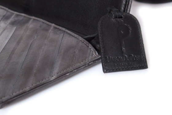 Image 1 of Maison Du Posh, pochette con anello a nocca e drago.