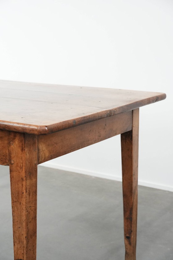 Image 1 of Early 19th century French fruitwood dining table with two drawers