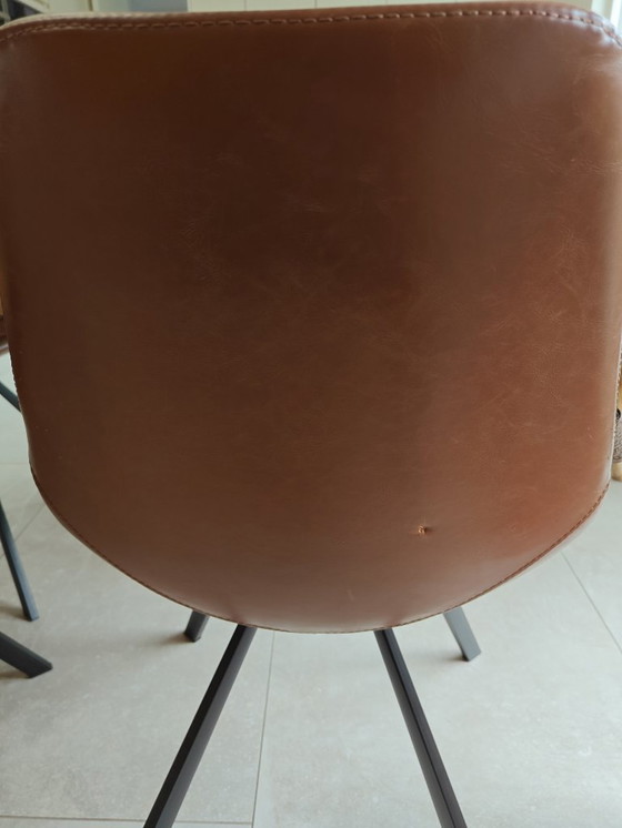 Image 1 of 7 Dutchbone cognac chairs