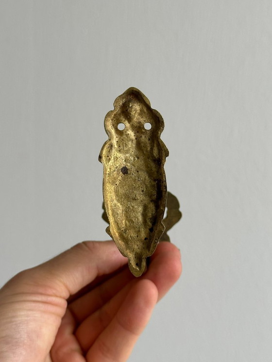 Image 1 of Kleiner Kleiderhaken aus vergoldetem Metall mit Schleifenmotiv