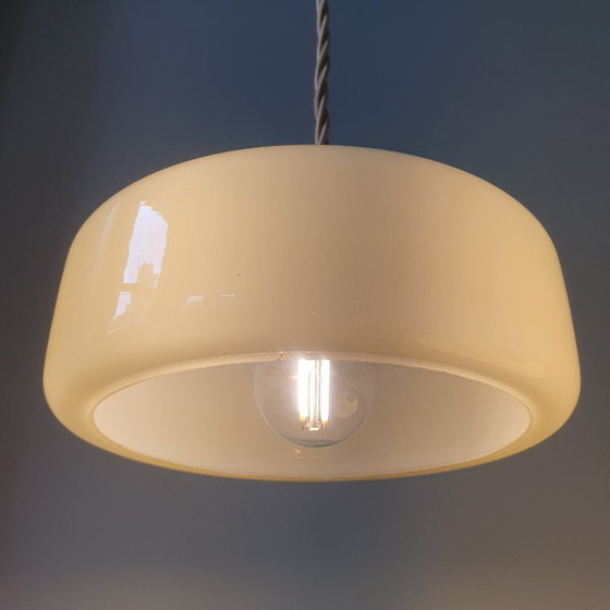 Image 1 of Vintage pendant lamp set (2) of yellow pastel opaline glass. Art Deco design.