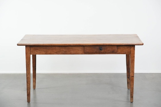 Image 1 of Early 19th century French fruitwood dining table with two drawers