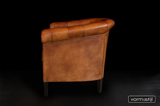 Image 1 of  Gecapitonneerde chesterfield clubfauteuils in het dikste schapenleer