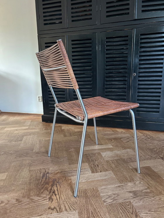 Image 1 of Conjunto de 6 sillas de diseño Bonacina Miss B en piel y acero inoxidable