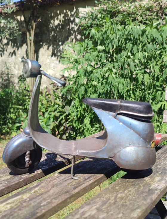 Image 1 of Vespa-style industrial scooter, numbered