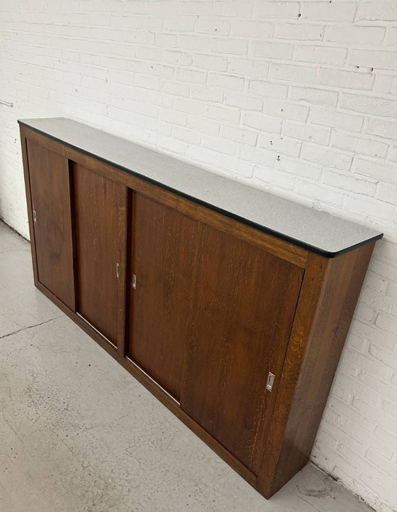 Image 1 of Vintage schoolkast - schuifdeurkast