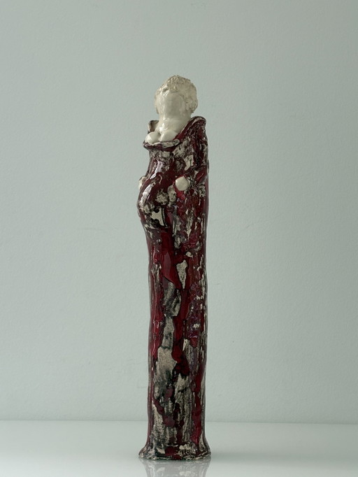 Ceramic statue of a pregnant woman