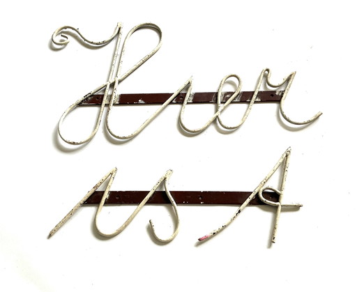 Vintage wrought iron facade letters