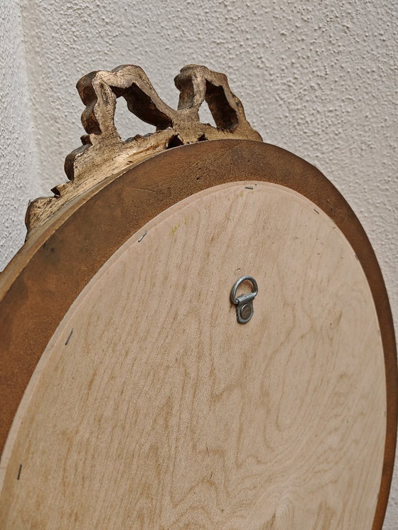 Image 1 of Ovale spiegel met houten lijst, goud uit een nalatenschap