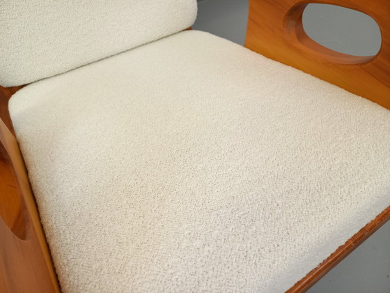 Image 1 of 50's Brutalistische Jean Touret schommelstoel in massief grenen en Bouclette stof