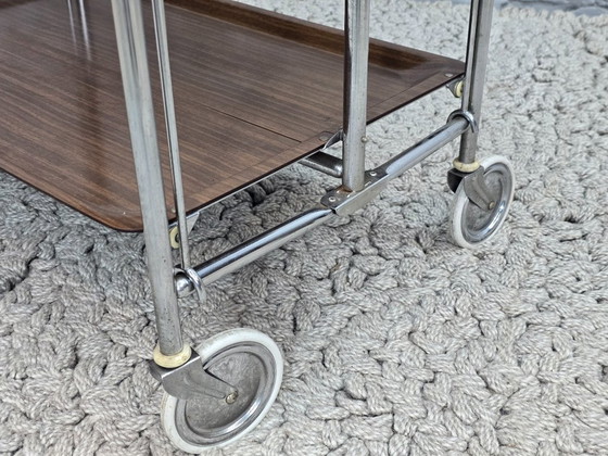Image 1 of Vintage Foldable and Mobile Chrome Steel 3 Faux Wood Layers ‘Dinett’ Serving Trolley by Gerlinol, Germany, 1970s. 