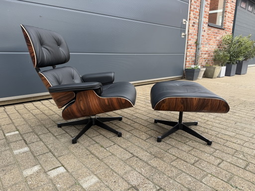 Sillón Eames Lounge original de Vitra + Otomana de palisandro